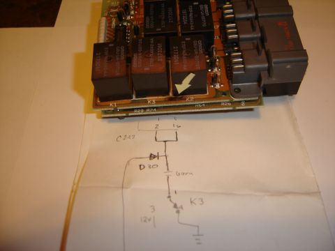 1996 Ford Bronco - RKE Burnt Etching - caused by the lead to the lock solenoid shorted to the door frame. The PO replaced the solenoid, and pinched the wire b…