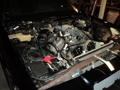 2004 Mercury Grand Marquis - Engine bay of a 2004 Mercury Grand Marquis showing a supercharger installation.