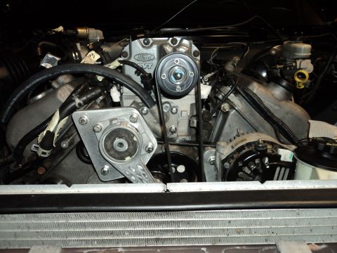 2004 Mercury Grand Marquis - Close-up of a supercharged V8 engine, Ford SVT branding on the supercharger.