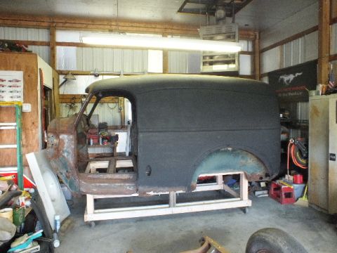 1946 International Travelall - body off of frame and on homemade dolly.
