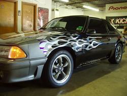 1993 Ford Mustang - This 1993 Ford Mustang has custom flame graphics on its exterior.