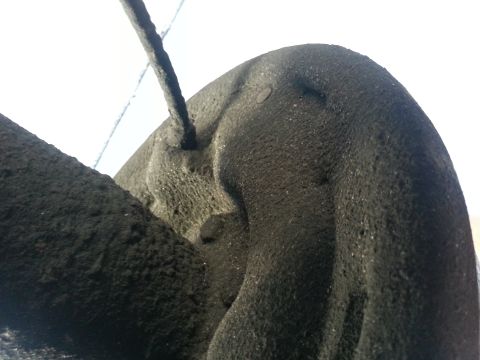 1994 Ford Bronco - This image shows a close-up view of a vehicle's rear brake assembly, covered in dust.