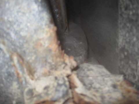 1993 Ford Bronco - This image shows heavily rusted metal parts, with the Supermotors.net logo in the lower right corner.