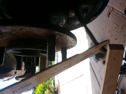 1994 Ford Bronco - A close-up view of a vehicle's brake assembly, possibly undergoing maintenance or repair.