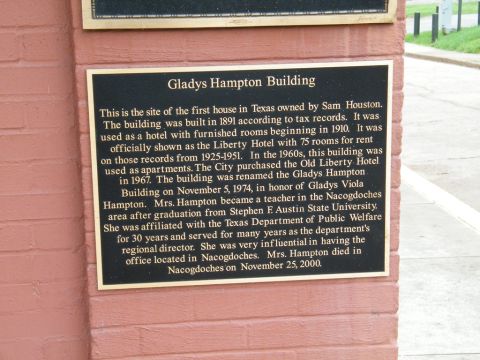 1909 Ford Model T - Historical marker details the history of the Gladys Hampton Building, originally built in 1891.