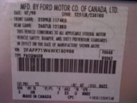 2001 Ford Crown Victoria - This vehicle identification label shows the manufacturing date as 07/98 and includes the VIN.
