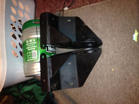 1995 Ford F-150 - These are truck suspension parts, possibly for a Ford F-150, shown with a keg and basket.