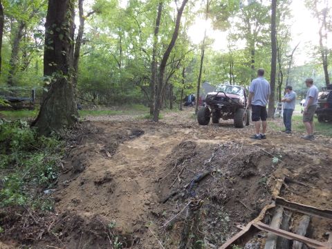1983 Ford Bronco - Greg & I had already cut this bank down slightly to reduce the breakover angle, so Jon had no trouble entering the creek.