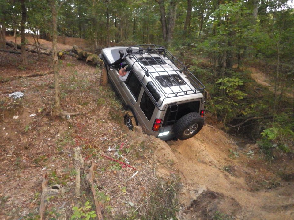 Greg was anxious to try it next, but the D2's breakover angle wasn't high enough.  His rear bumper hit harder than Jon's had.