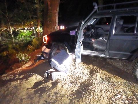 1983 Ford Bronco - By the time he went from nose-down in the creek to being up on top, the front tire had nearly come off.