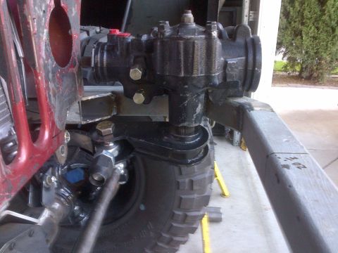 1985 Jeep CJ7 - Jeep steering box and suspension components are visible in this close-up shot.
