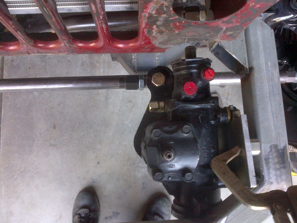 close-up of vehicle steering box and linkage