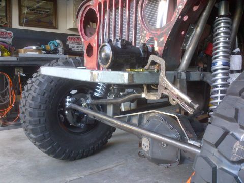 1985 Jeep CJ7 - Custom suspension components are visible on this Jeep CJ-series, with a clamp attached to the frame.