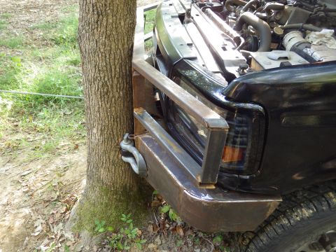 1983 Ford Bronco - At full stall, the bumper almost seemed to wrap around this tree. But the bumper didn't bend at all.