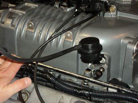 2004 Mercury Grand Marquis - A close-up view of a supercharger assembly, likely part of an engine modification.