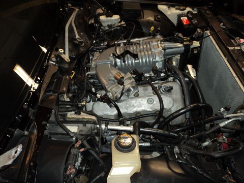 2004 Mercury Grand Marquis - Engine bay modifications are visible, including a prominent supercharger.
