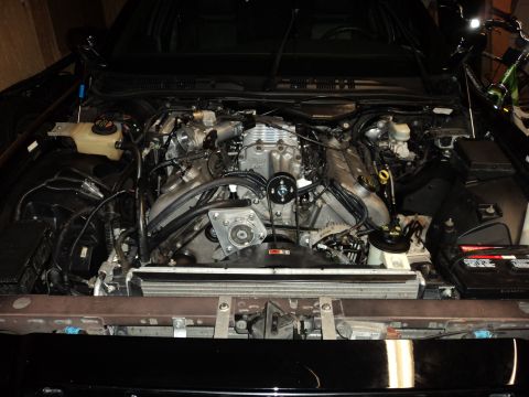 2004 Mercury Grand Marquis - Engine bay view of a V8 engine modified with a supercharger.