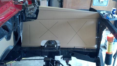 1964 Ford Fairlane - A cardboard template is laid out on the car's firewall, marked with lines and Xs for cutting.