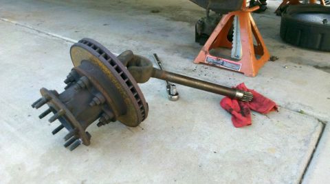 1997 Dodge 3500 - Front axle and brake rotor removed from a Dodge 3500 for service.