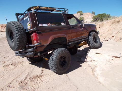 1986 Ford Bronco II - This modified 1986 Ford Bronco II navigates a challenging off-road course, its capabilities.