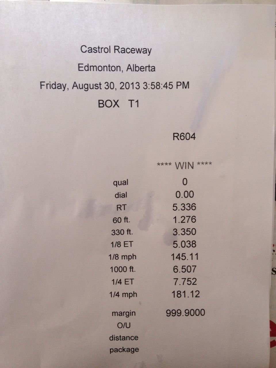 Racing slip from Castrol Raceway with race data and Supermotors.net logo