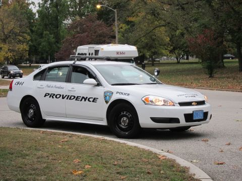 2001 Ford Crown Victoria - Photograph of a Providence Police Chevrolet Impala cruiser, not a technical document.