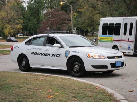 2001 Ford Crown Victoria - Photograph of a Providence Police Chevrolet Impala cruiser, not a technical document.