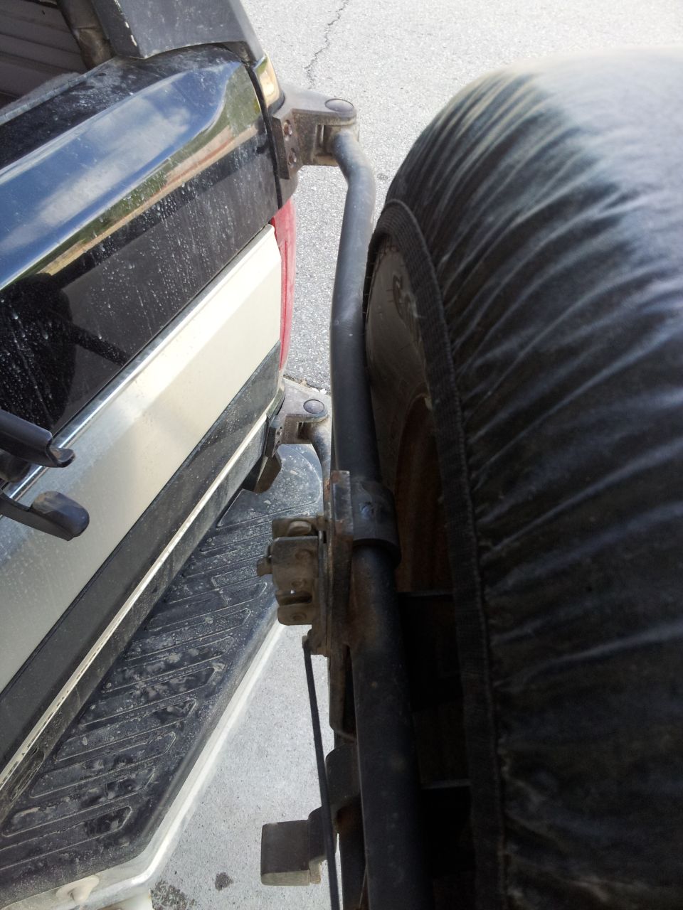 Bent the hell outta the tire carrier.