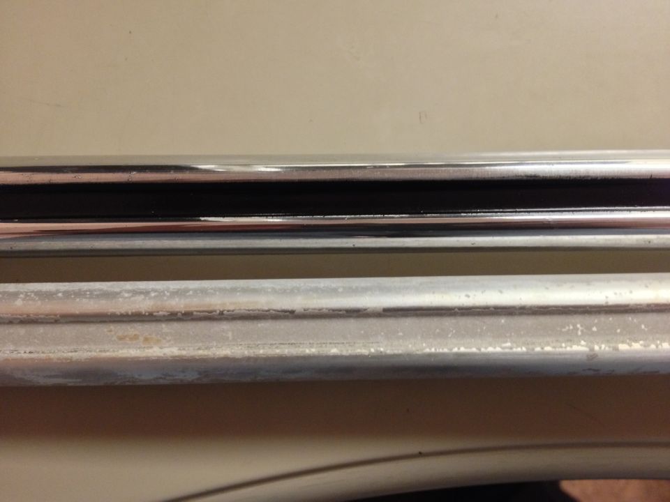 Chrome and weathered aluminum trim pieces