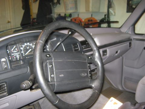 1996 Ford Bronco - The interior of a 1996 Ford Bronco, the steering wheel and instrument cluster.