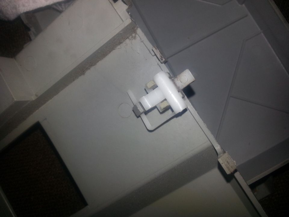 Interior plastic trim with white latch mechanism