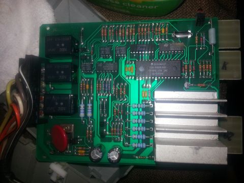 1994 Ford Bronco - Close-up of an electronic circuit board with various components and wiring.