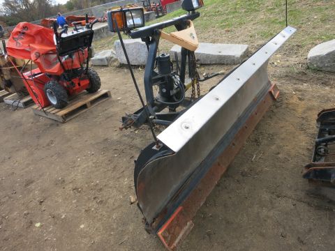 1991 Ford LTD Crown Victoria - A snow plow and a snow blower are parked outdoors on a dirt lot.