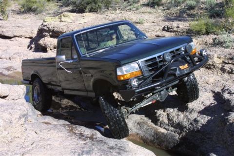 1994 Ford Bronco - This 1994 Ford F-150 pickup navigates a rocky, off-road course, demonstrating its capabilities.