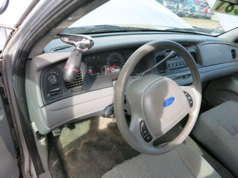 1991 Ford LTD Crown Victoria - Interior view of a 1991 Ford Crown Victoria, showing the dashboard, steering wheel, and seats.