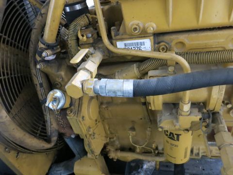 1991 Ford LTD Crown Victoria - Photograph of a CAT generator engine, not a technical document.
