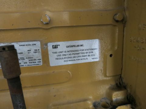 1991 Ford LTD Crown Victoria - Caterpillar EPA compliance label and 3306 engine spec plate stating the unit is for stationary use under 40 CFR Part 89.2(2).