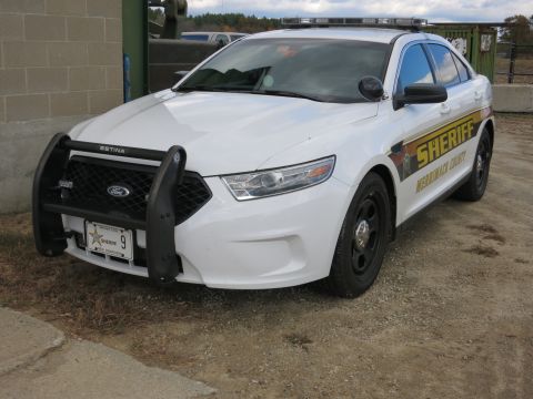 1991 Ford LTD Crown Victoria - Photograph of a Merrimack County Sheriff Ford Taurus patrol car, not a technical document.