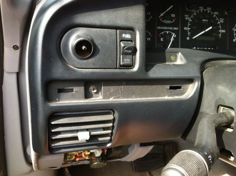 1996 Ford F-150 - Interior view of a 1996 Ford F-150 dashboard, gauges and climate control switches.