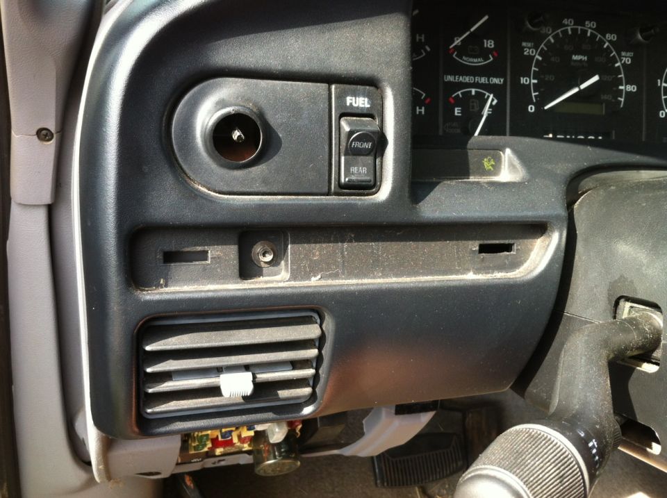1996 Ford F-150 dashboard showing fuel gauge, speedometer, and climate controls