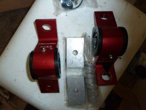 2007 Subaru Impreza - Aftermarket suspension components are laid out, ready for installation.